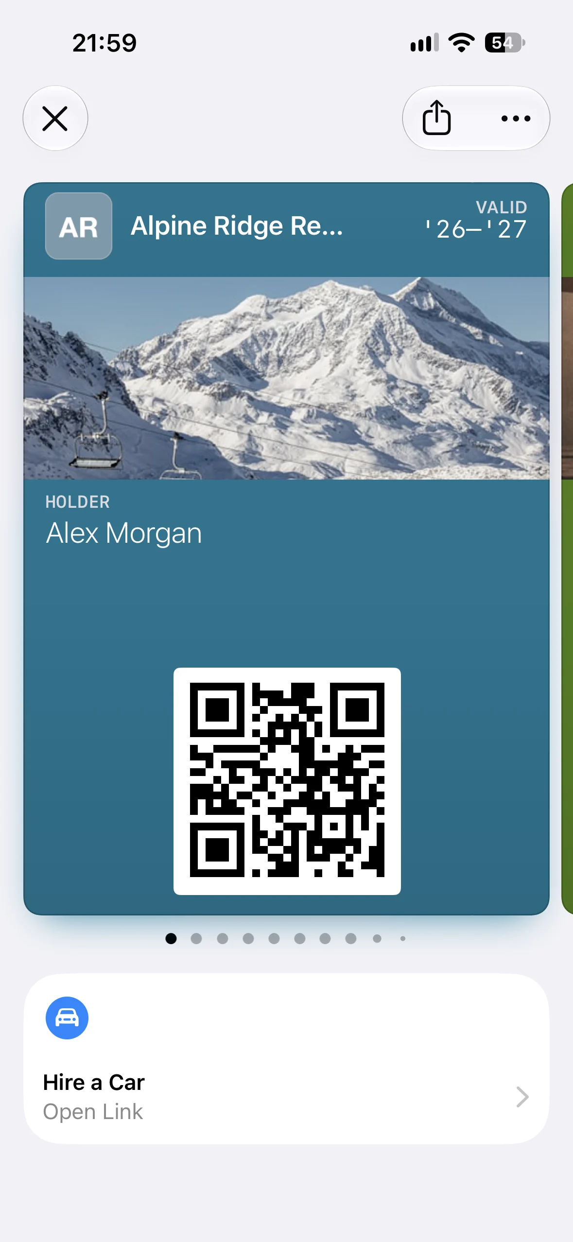 An Alpine Ridge Resorts membership pass in Apple Wallet with the Hire a Car Featured Action beneath it
