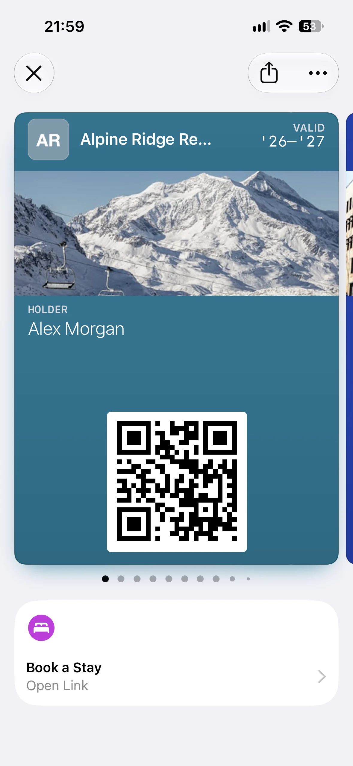 An Alpine Ridge Resorts membership pass in Apple Wallet with the Book a Stay Featured Action beneath it