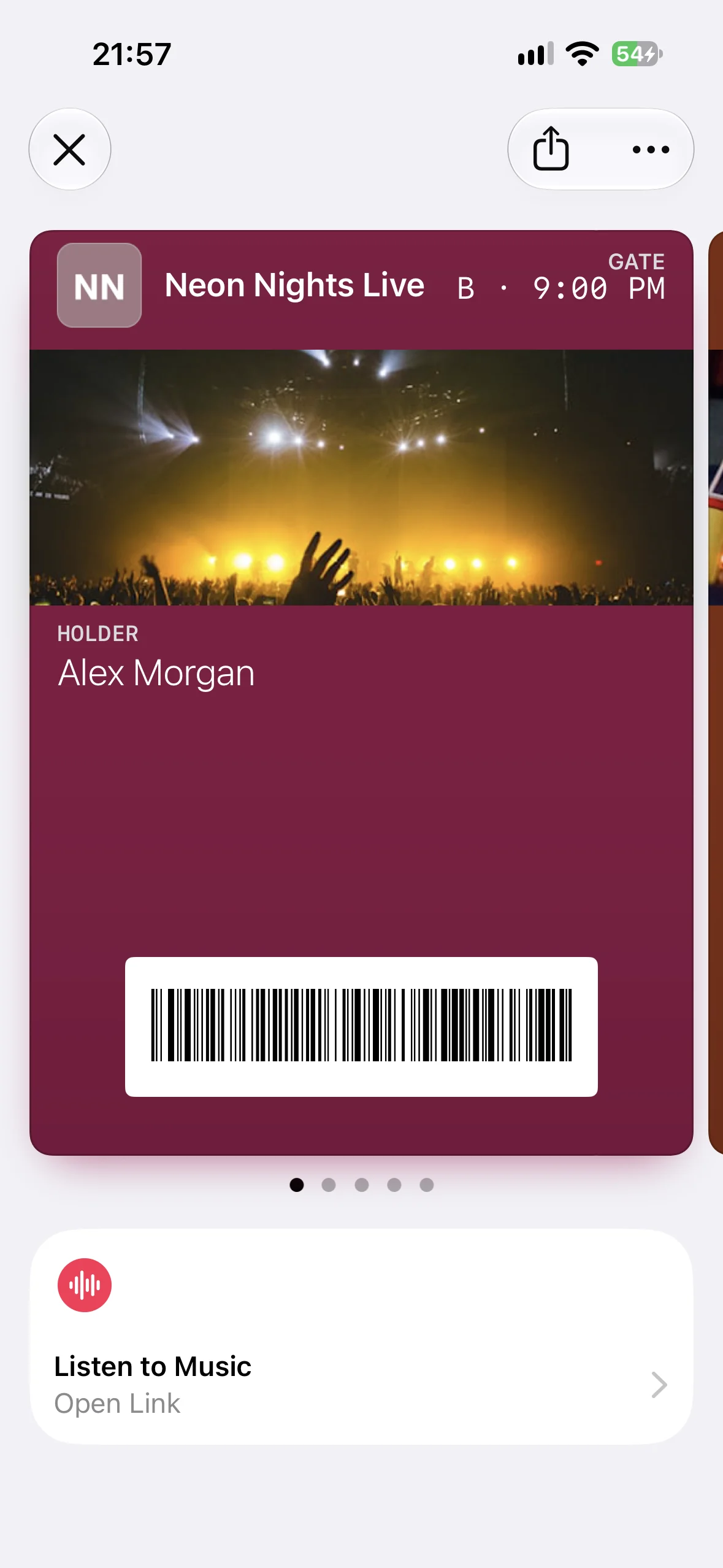A Neon Nights Live event pass in Apple Wallet with the Listen to Music Featured Action beneath it
