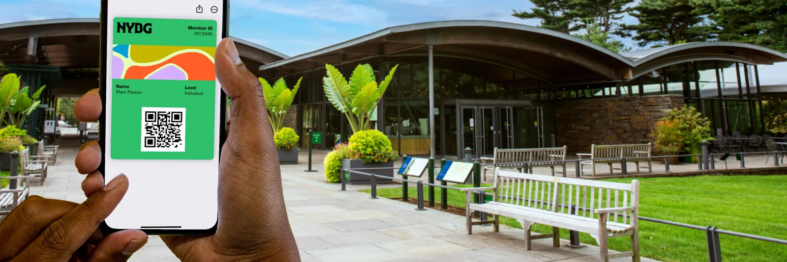 New York Botanical Garden digital membership card with member ID and QR code shown on a phone at the garden